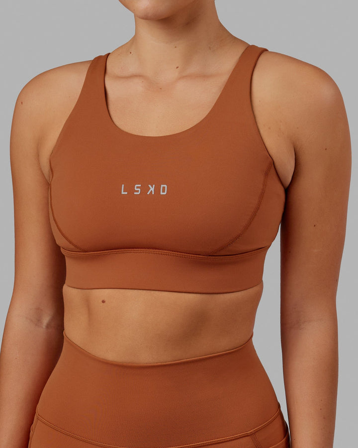 Woman wearing Propel Sports Bra - Hazel