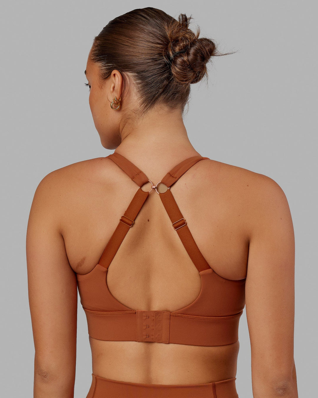 Woman wearing Propel Sports Bra - Hazel