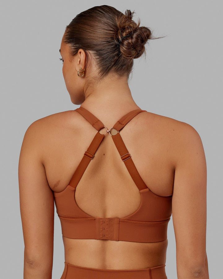 Woman wearing Propel Sports Bra - Hazel