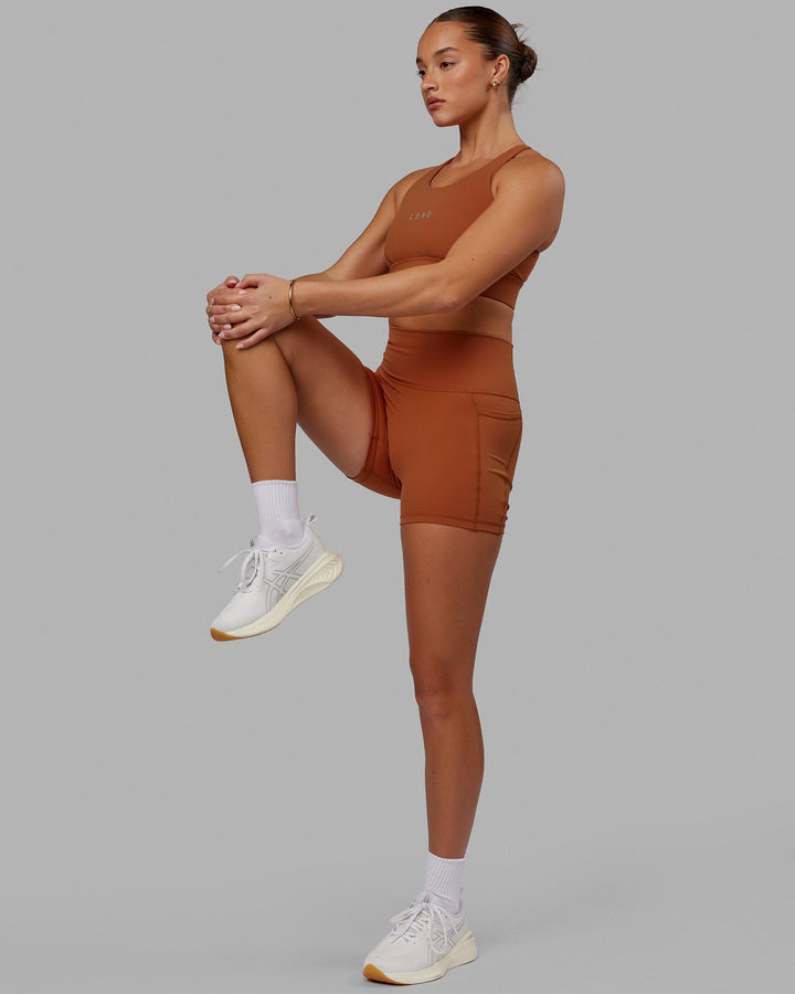 Woman wearing Propel Sports Bra - Hazel