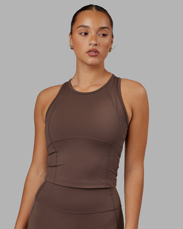 Woman wearing Propel Performance Tank - Peppercorn