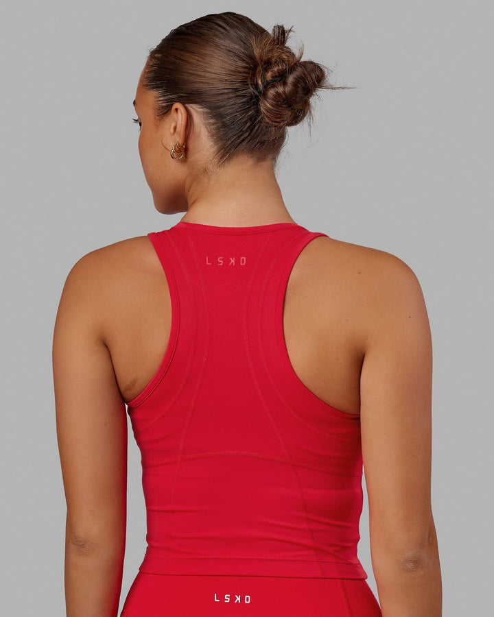 Woman wearing Propel Performance Tank - Scarlet