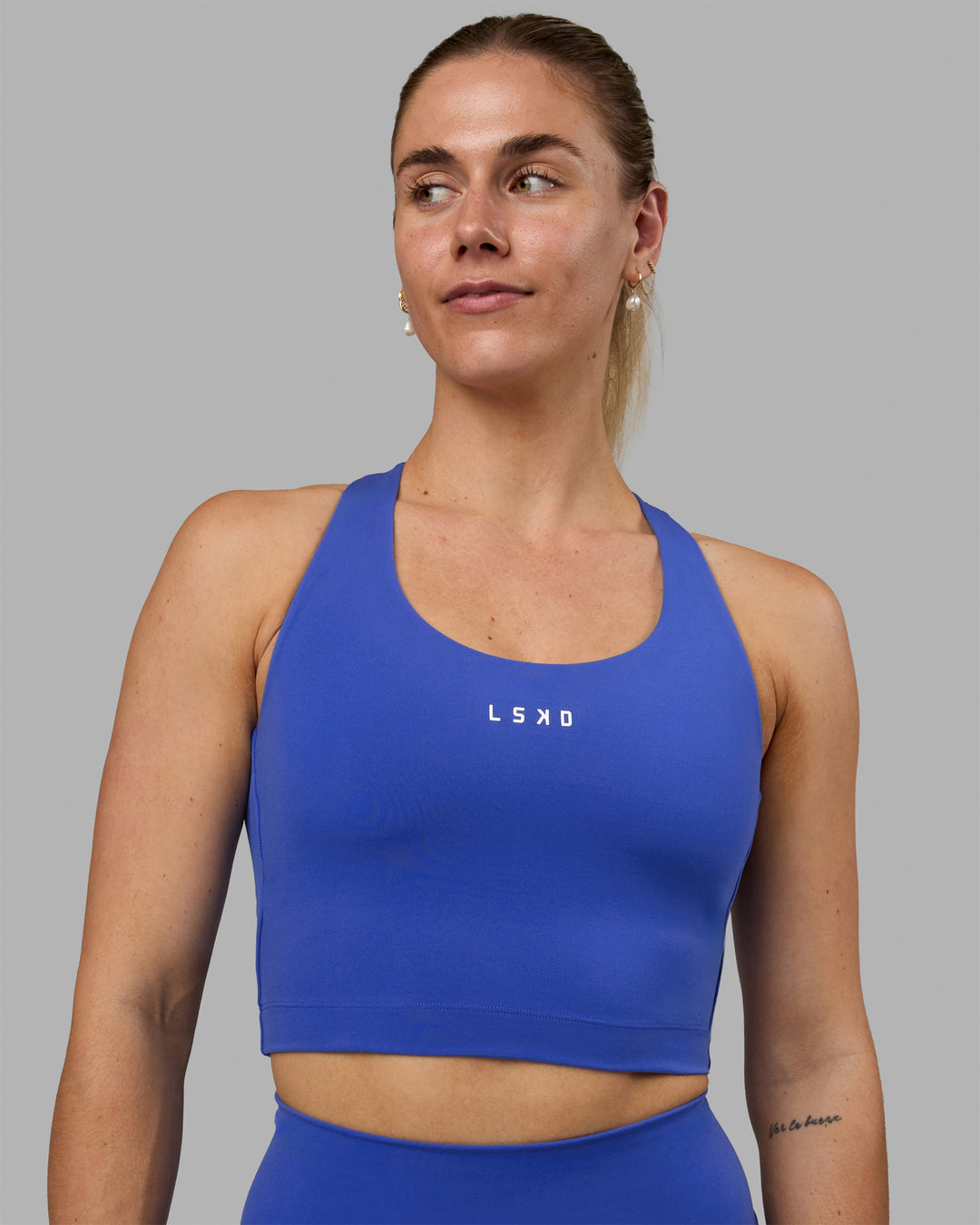Woman wearing Pulse Active Tank - Power Cobalt