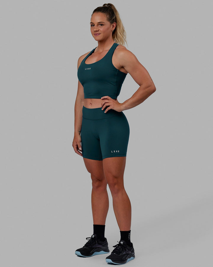 Woman wearing Pulse Active Tank - Tidal Teal
