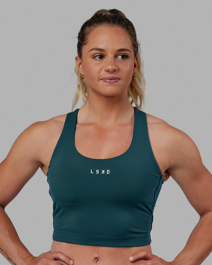 Woman wearing Pulse Active Tank - Tidal Teal