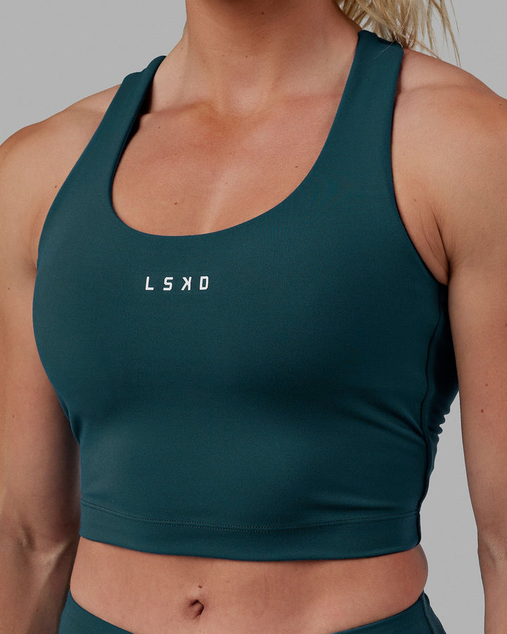 Woman wearing Pulse Active Tank - Tidal Teal