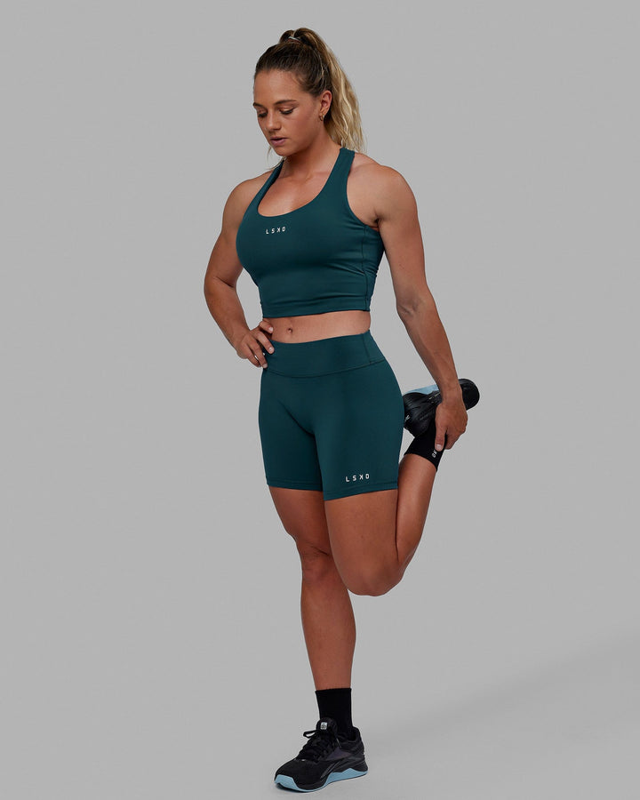 Woman wearing Pulse Active Tank - Tidal Teal