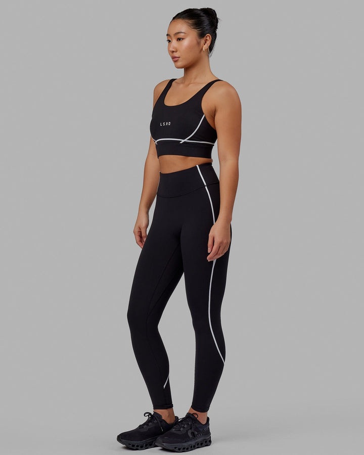 Woman wearing Pulse Full Length Tight - Black