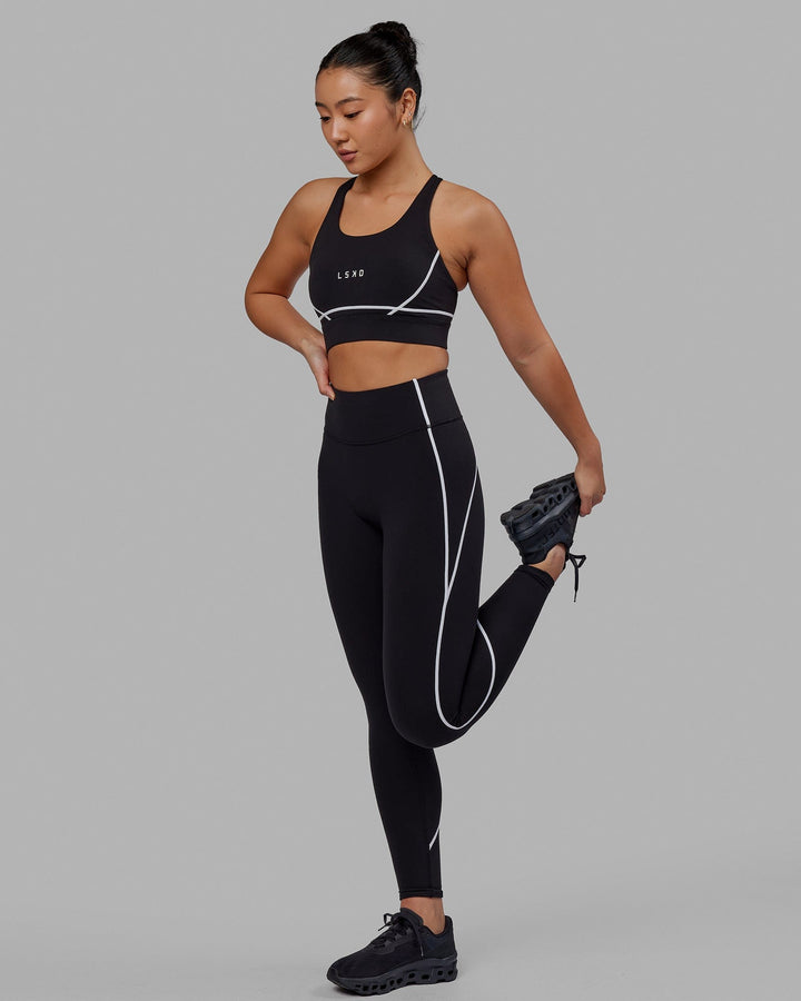 Woman wearing Pulse Full Length Tight - Black