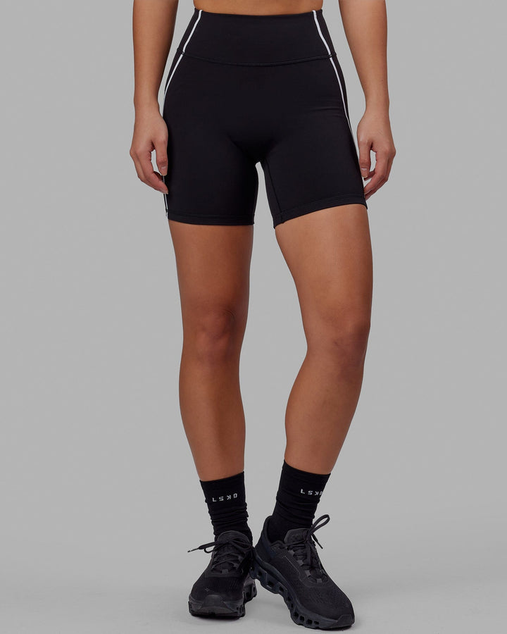 Woman wearing Pulse Mid Short Tight - Black