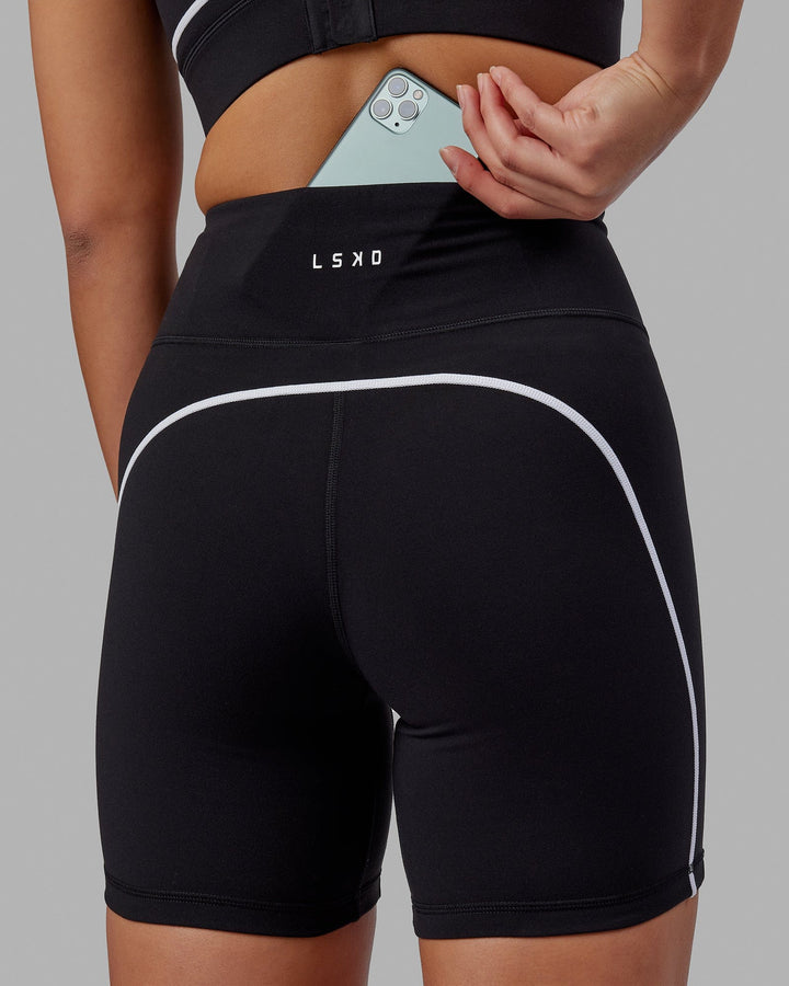 Woman wearing Pulse Mid Short Tight - Black