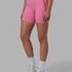 Woman wearing Pulse Mid Short Tights - Pink Rose-Scarlet