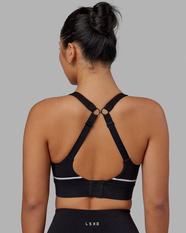 Woman wearing Pulse Sports Bra - Black