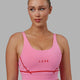 Woman wearing Pulse Sports Bra - Pink Rose-Scarlet