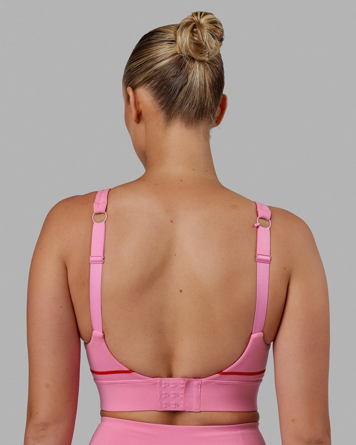 Woman wearing Pulse Sports Bra - Pink Rose-Scarlet