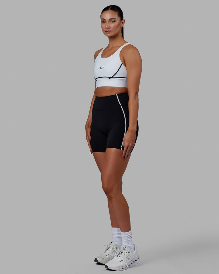 Woman wearing Pulse Sports Bra - White