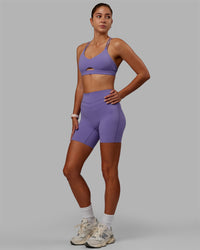 Woman wearing Pursue Sports Bra - Dahlia Purple