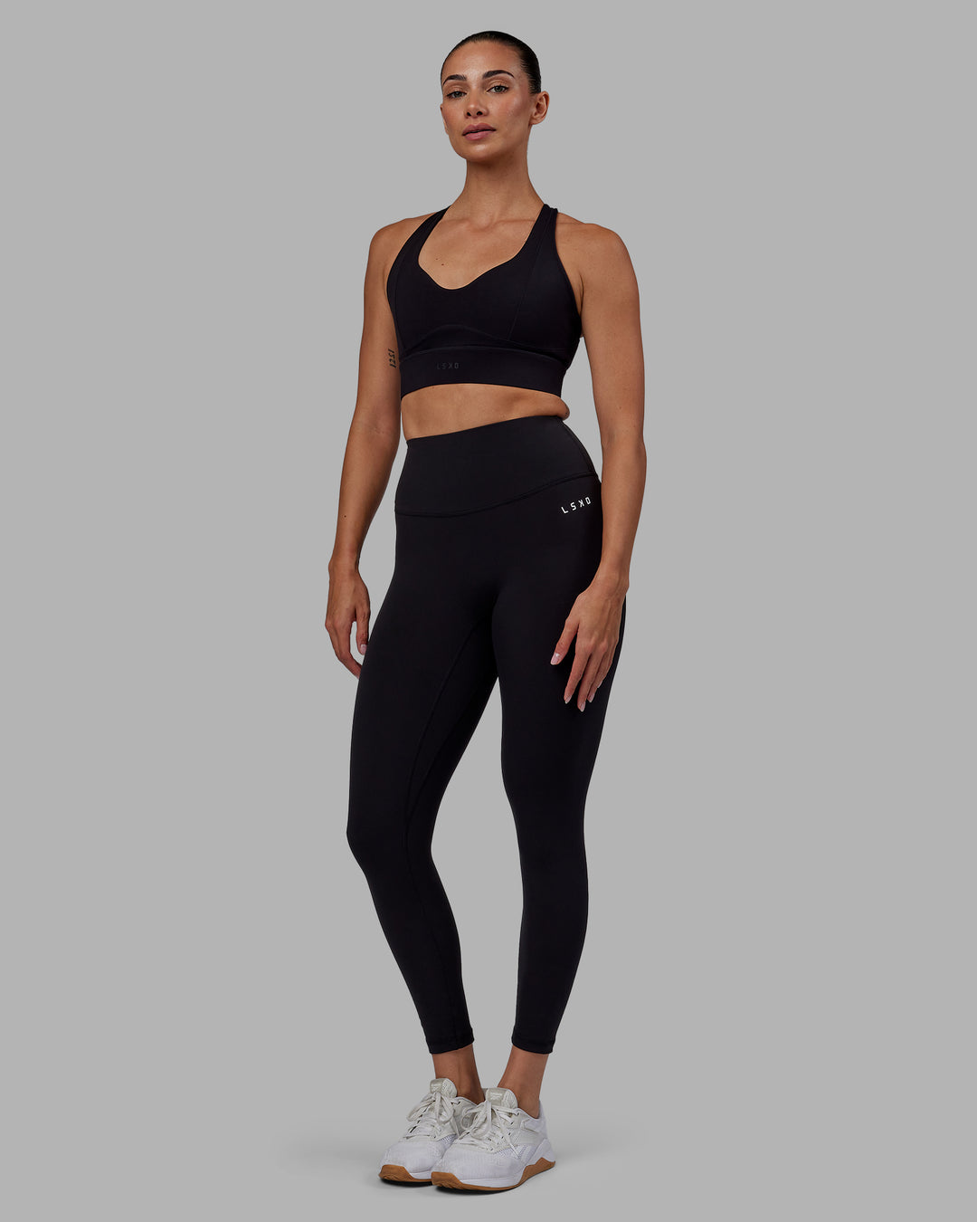 Woman wearing RXD High-Rise 7/8 Legging - Black