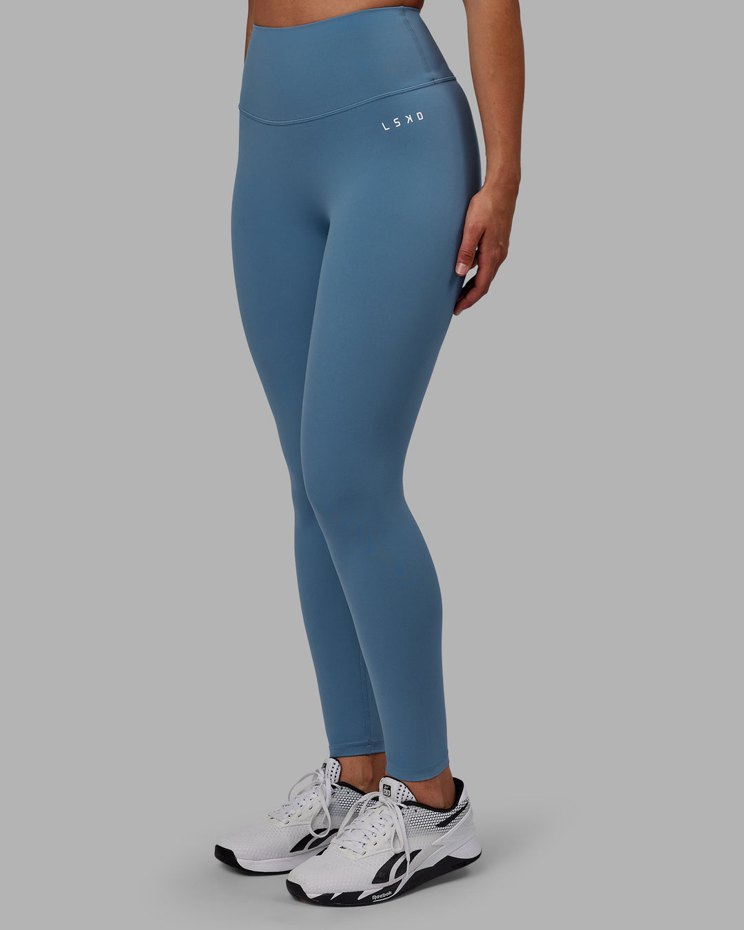 Woman wearing RXD High-Rise Full Length Legging - Elemental Blue