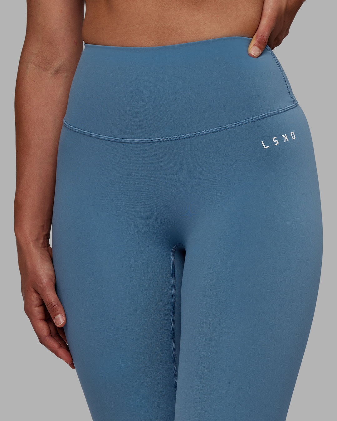 Woman wearing RXD High-Rise Full Length Legging - Elemental Blue
