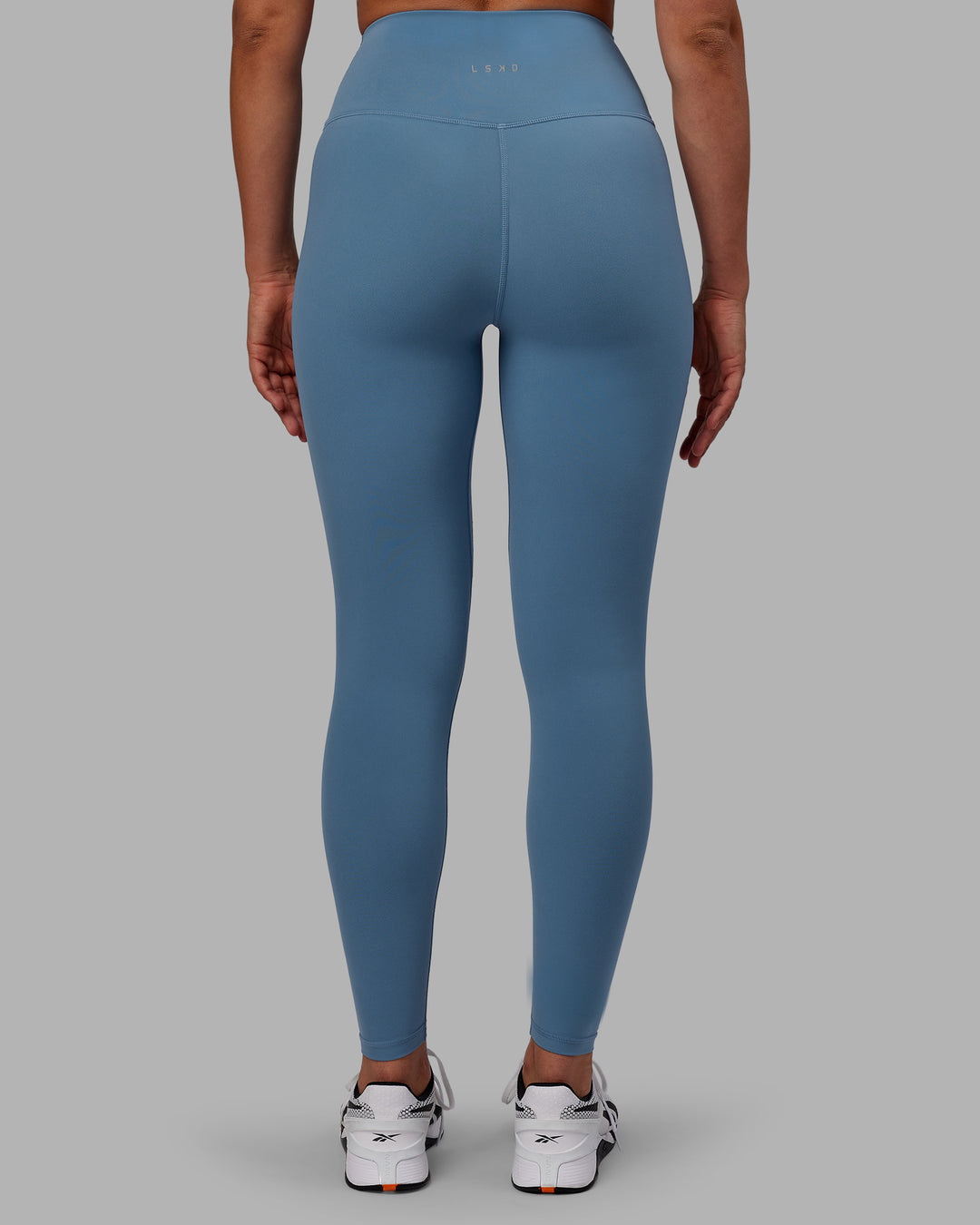 Woman wearing RXD High-Rise Full Length Legging - Elemental Blue