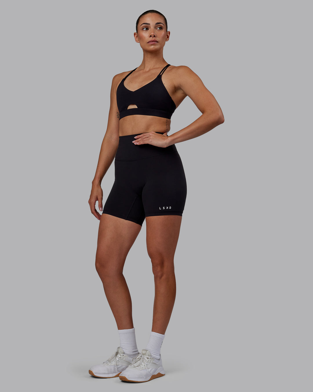 Woman wearing RXD High-Rise 6&quot; Short - Black