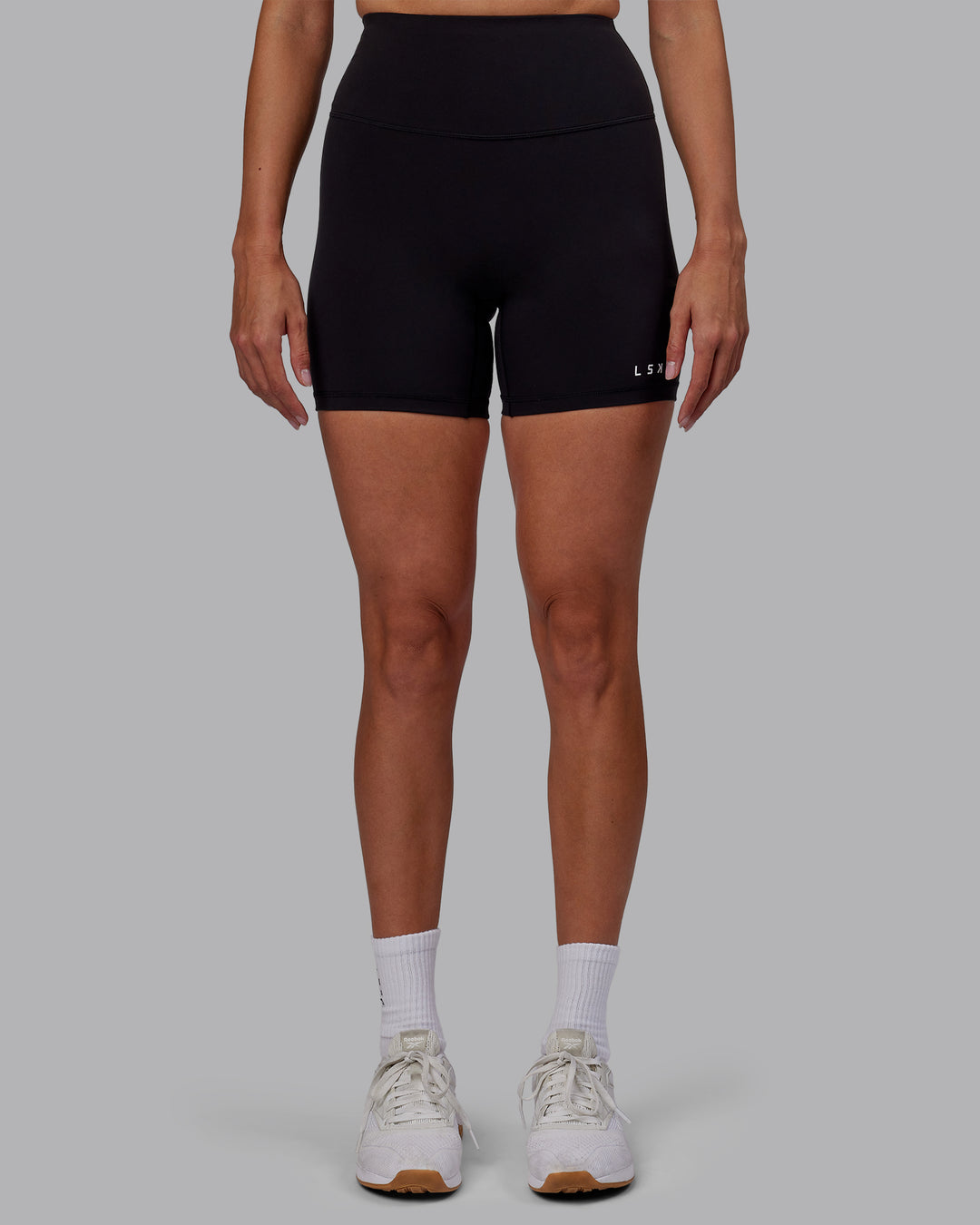 Woman wearing RXD High-Rise 6&quot; Short - Black