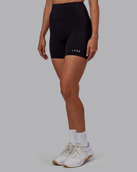 Woman wearing RXD High-Rise 6" Short - Black