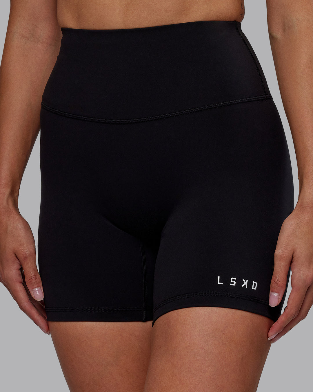 Woman wearing RXD High-Rise 6&quot; Short - Black