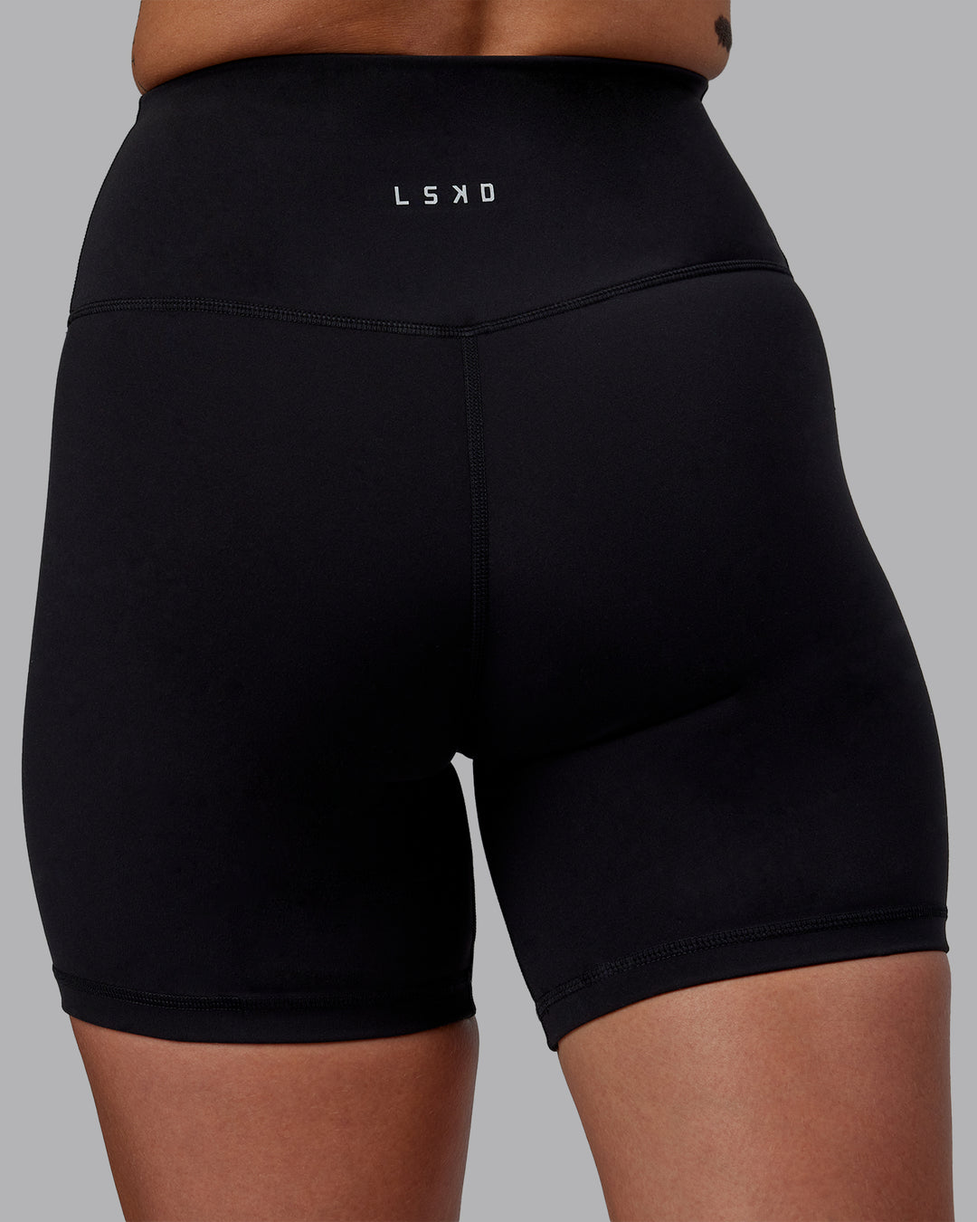 Woman wearing RXD High-Rise 6&quot; Short - Black