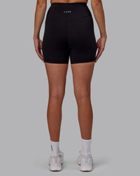Woman wearing RXD High-Rise 6" Short - Black