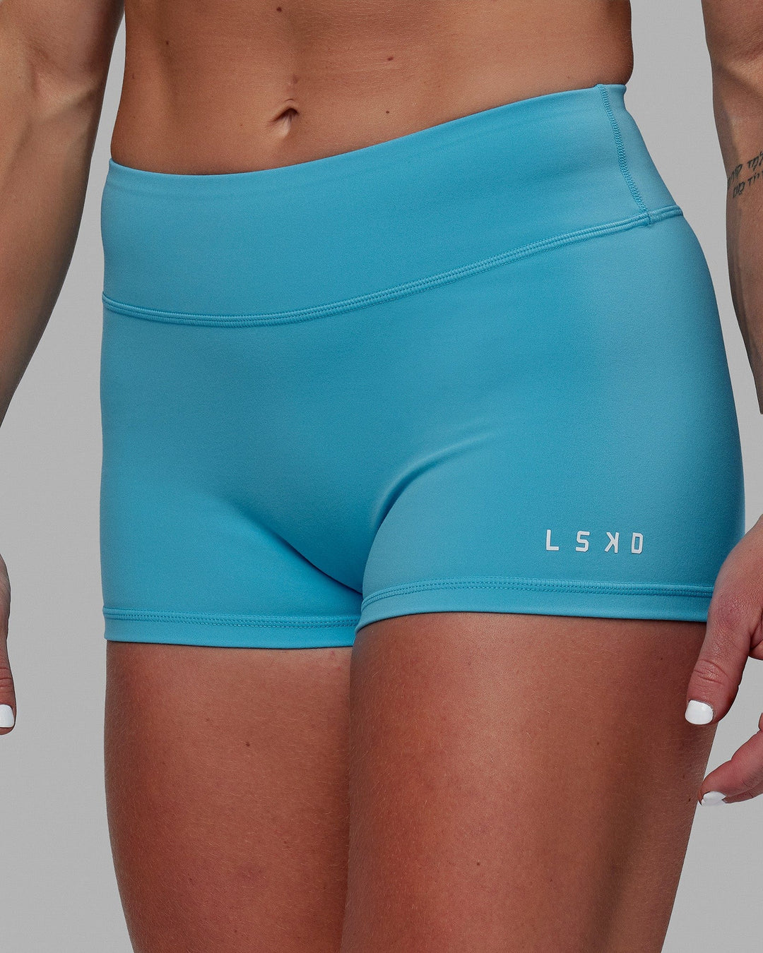 Woman wearing RXD Micro Short Tights - Pacific Blue