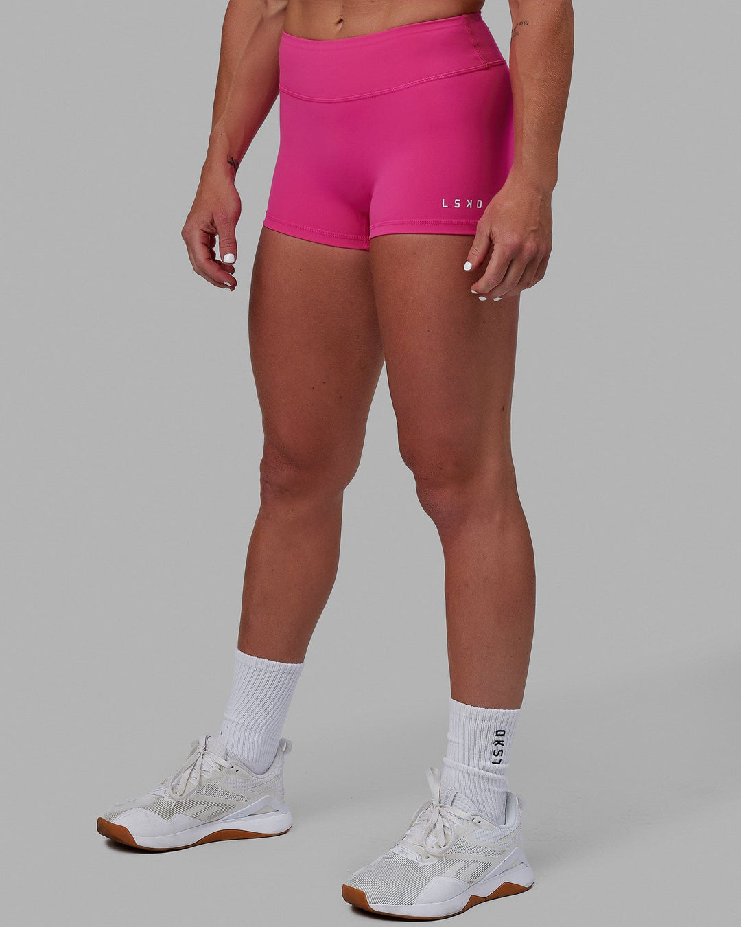 Woman wearing RXD Micro Short Tights - Ultra Pink