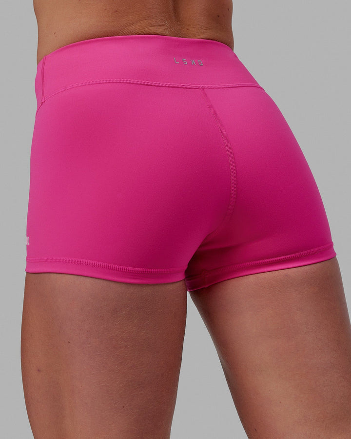 Woman wearing RXD Micro Short Tights - Ultra Pink