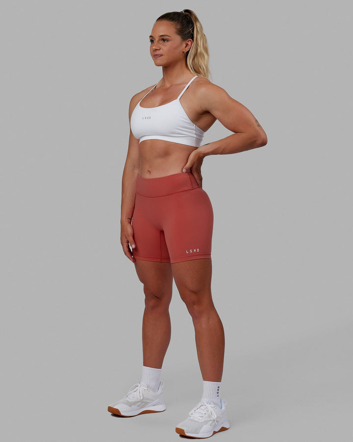 Woman wearing RXD Mid Short Tight - Mineral Red