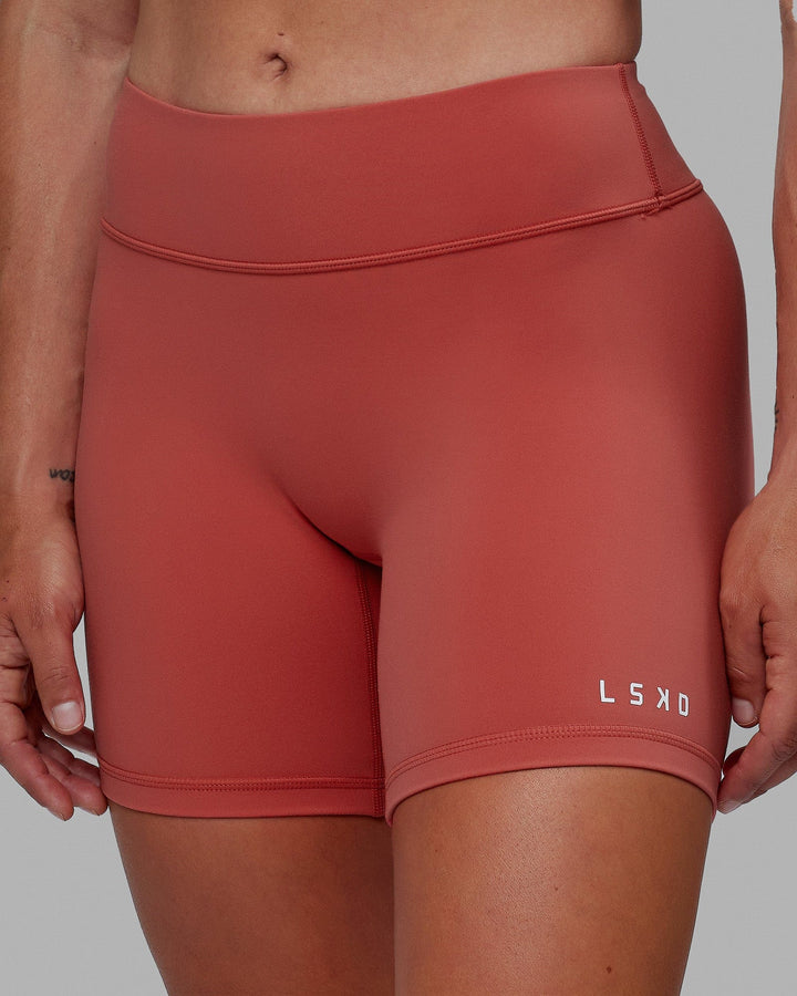 Woman wearing RXD Mid Short Tight - Mineral Red