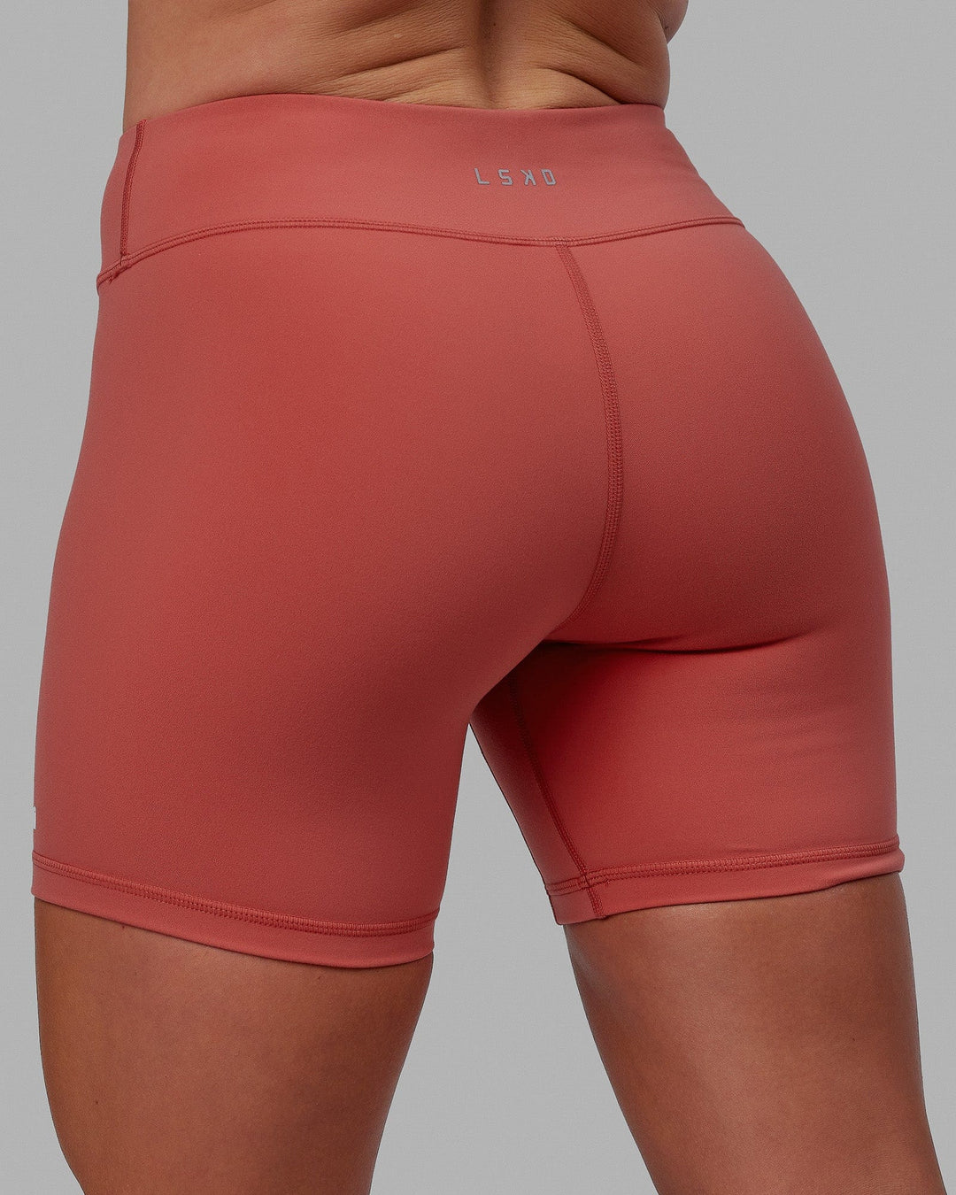 Woman wearing RXD Mid Short Tight - Mineral Red