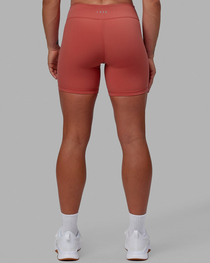 Woman wearing RXD Mid Short Tight - Mineral Red