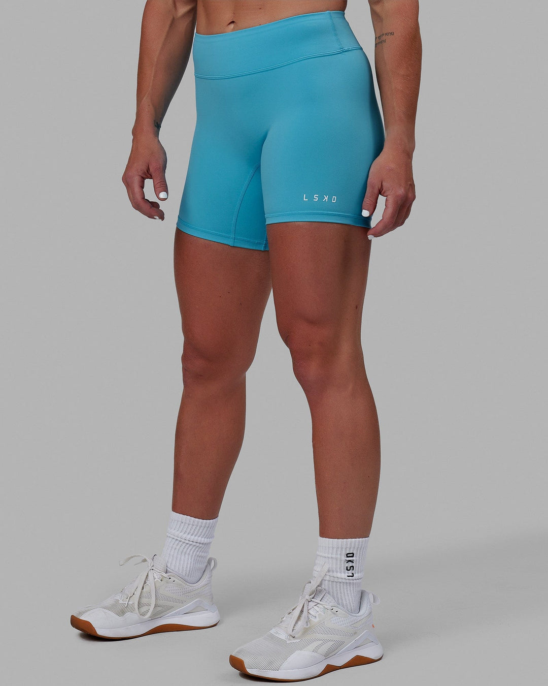 Woman wearing RXD Mid Short Tights - Pacific Blue