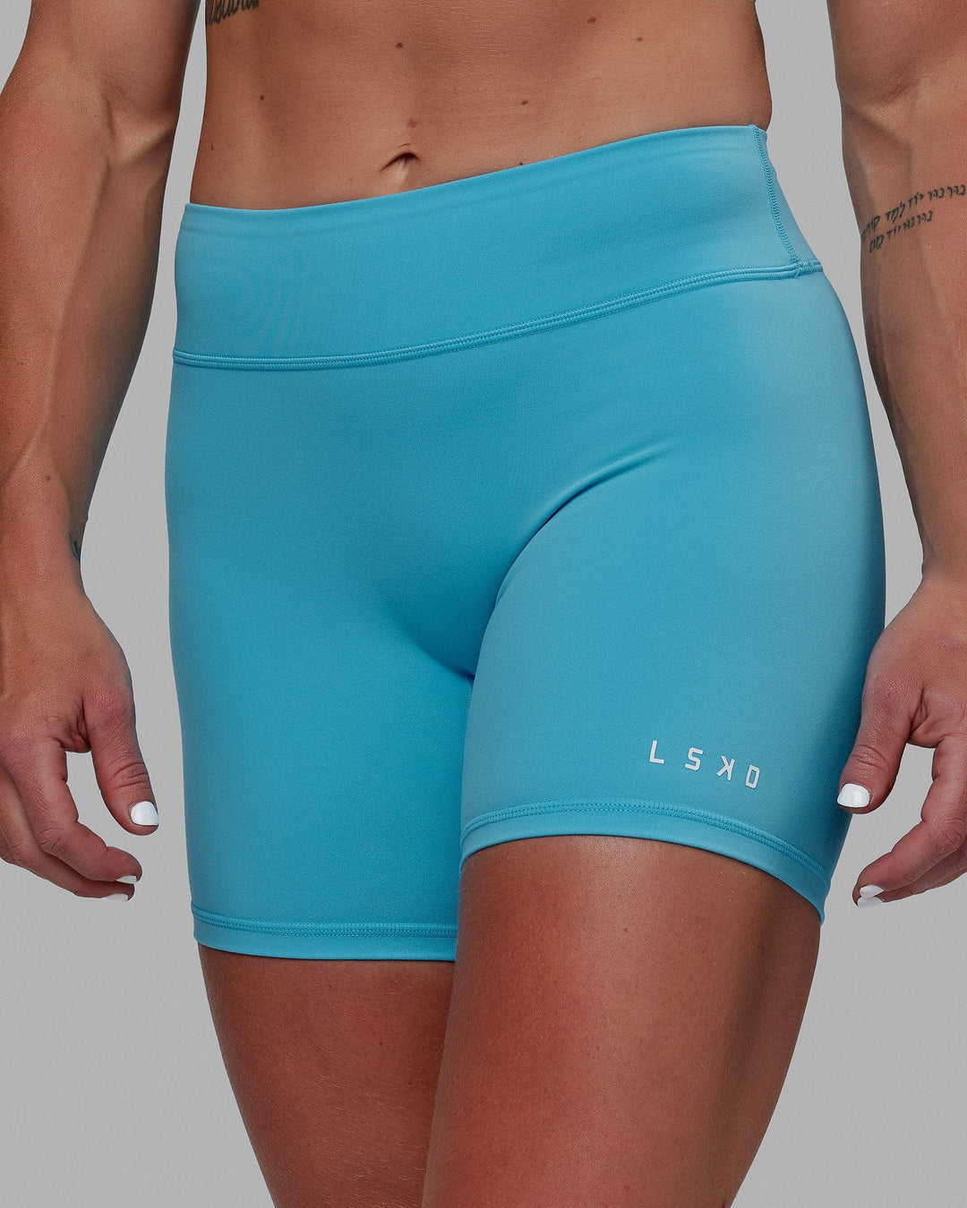Woman wearing RXD Mid Short Tights - Pacific Blue
