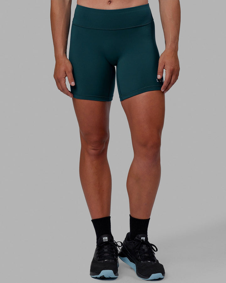 Woman wearing RXD Mid Short Tight - Tidal Teal