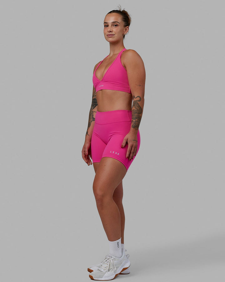 Woman wearing RXD Mid Short Tights - Ultra Pink