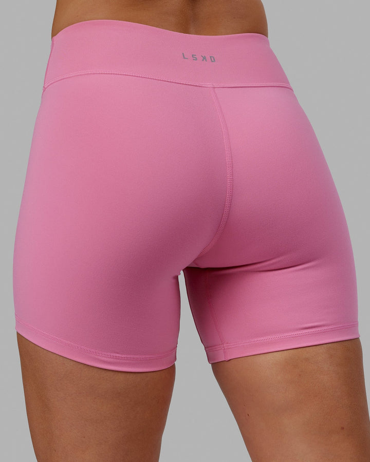 Woman wearing RXD Mid Short Tights - Pink Rose-Scarlet