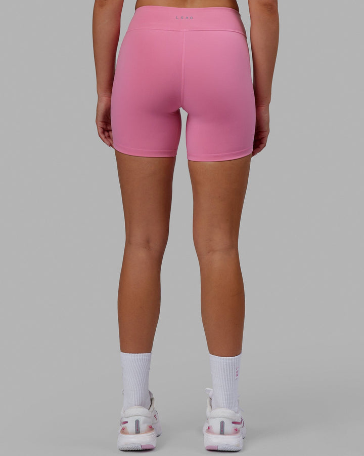 Woman wearing RXD Mid Short Tights - Pink Rose-Scarlet