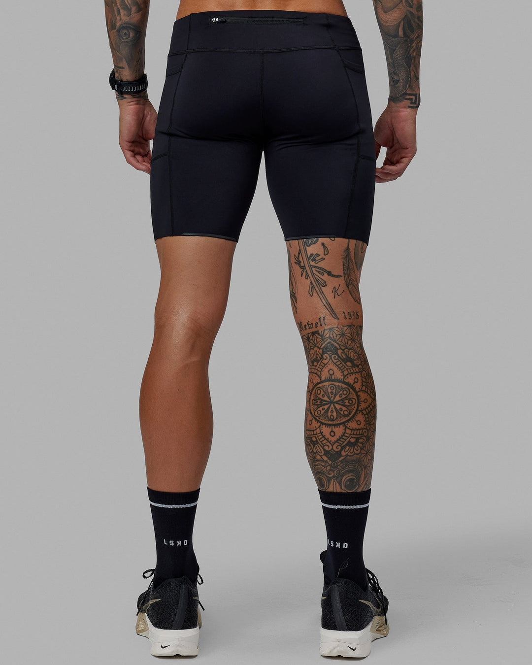 Man wearing Race Day 8" Short Tight - Black
