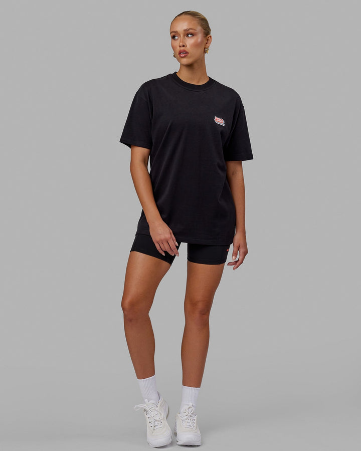 Woman wearing Unisex Radiate Heavyweight Tee Oversize - Black