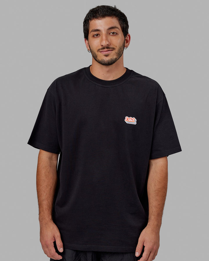 Man wearing Unisex Radiate Heavyweight Tee Oversize - Black