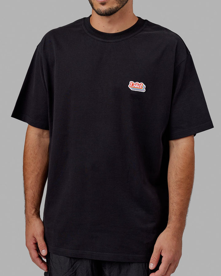 Man wearing Unisex Radiate Heavyweight Tee Oversize - Black