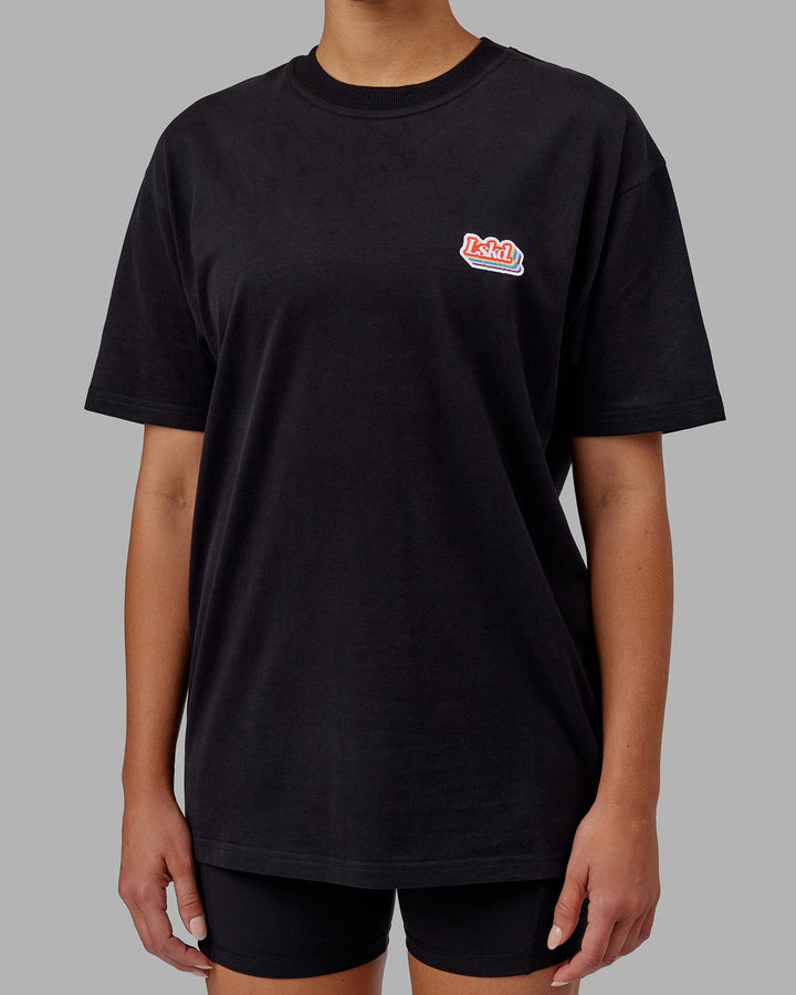 Woman wearing Unisex Radiate Heavyweight Tee Oversize - Black