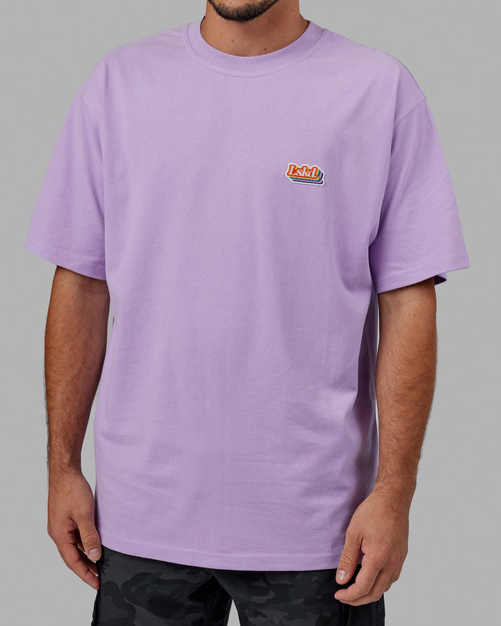 Man wearing Unisex Radiate Heavyweight Tee Oversize - Pale Lilac